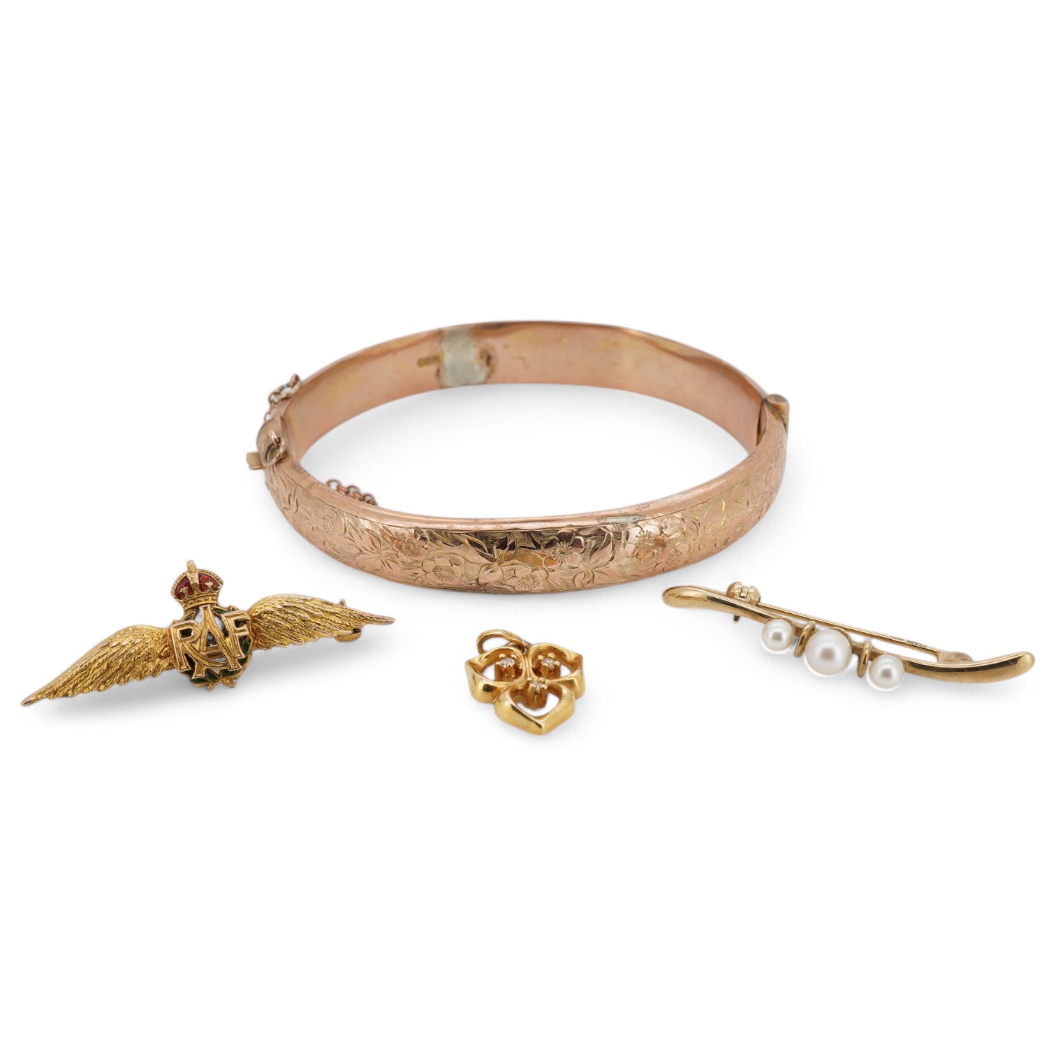 A George V 9ct gold bangle, a 375 and cultured pearl bar brooch,37mm, a modern 9ct gold and three stone diamond set small pendant and a 9ct sweetheart RAF brooch, gross weight 15.5 grams. Condition - poor to fair